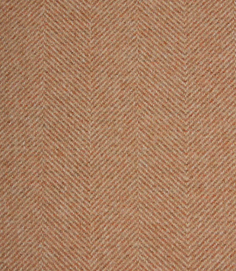 Textured fabric with a herringbone pattern in terracotta tones