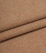 Close-up of terracotta herringbone fabric texture