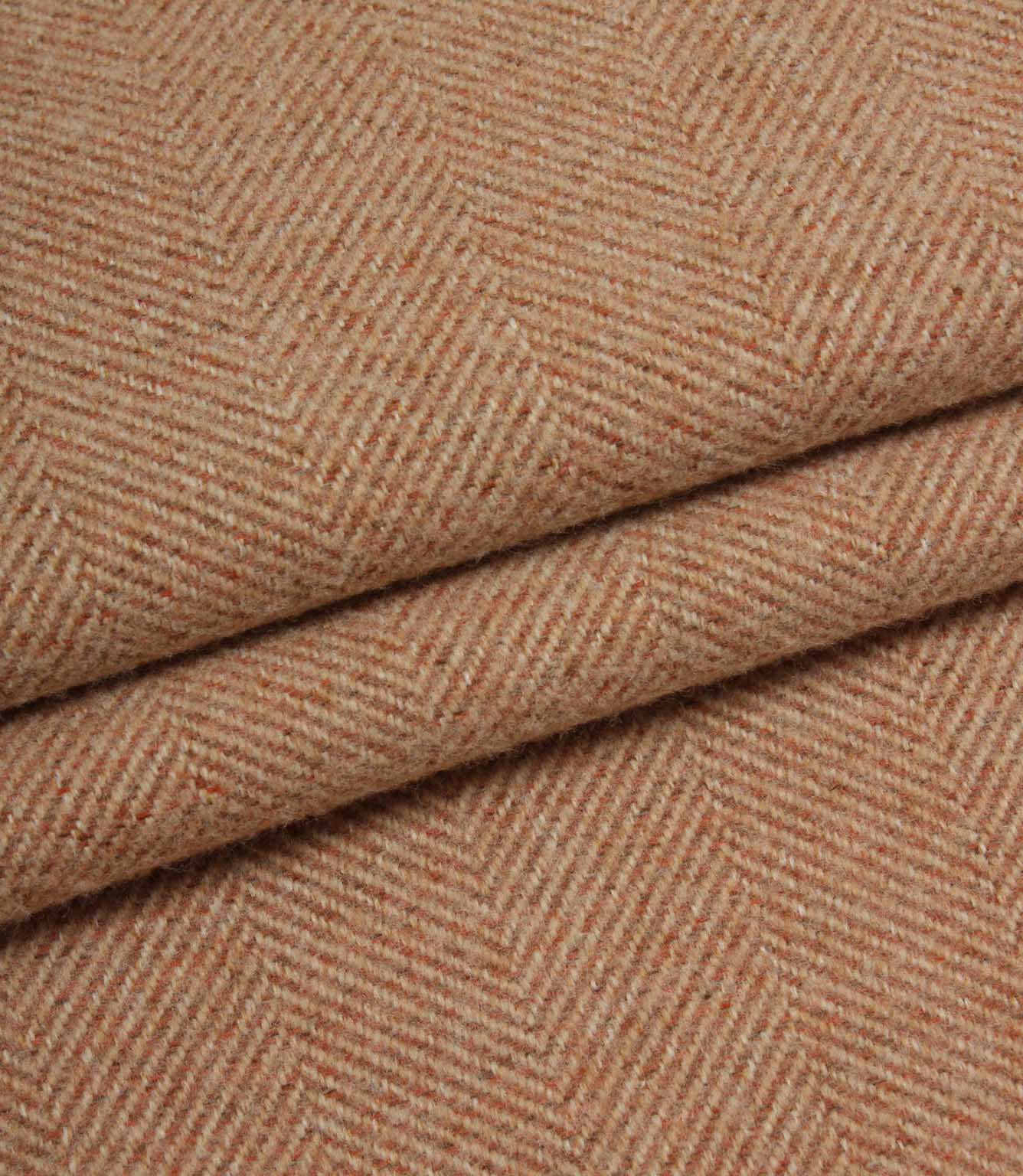Close-up of terracotta herringbone fabric texture