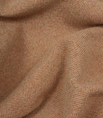Close-up of terracotta herringbone fabric texture
