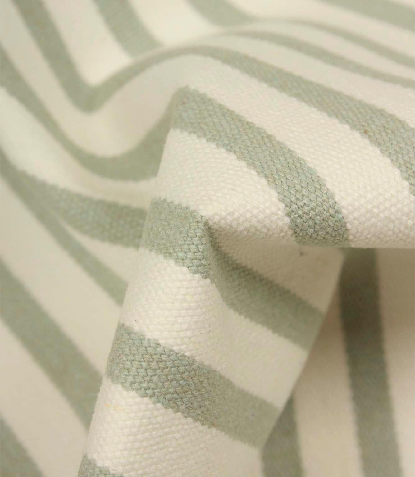 Detailed close-up of Fernley Stripe upholstery fire retardant fabric showing the woven sage green stripe pattern and textured surface finish.