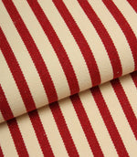 Folded Fernley Stripe upholstery fire retardant fabric featuring wine red vertical stripes and a classic woven finish.