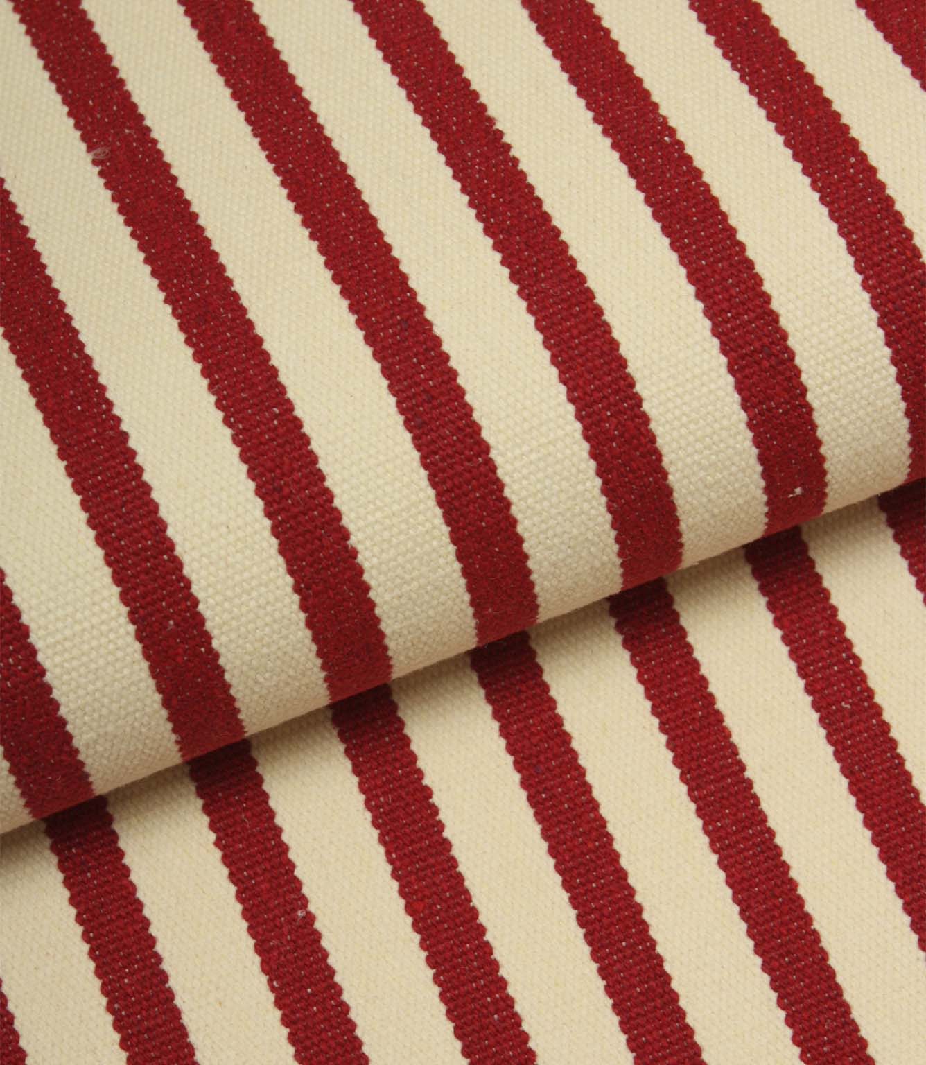 Folded Fernley Stripe upholstery fire retardant fabric featuring wine red vertical stripes and a classic woven finish.