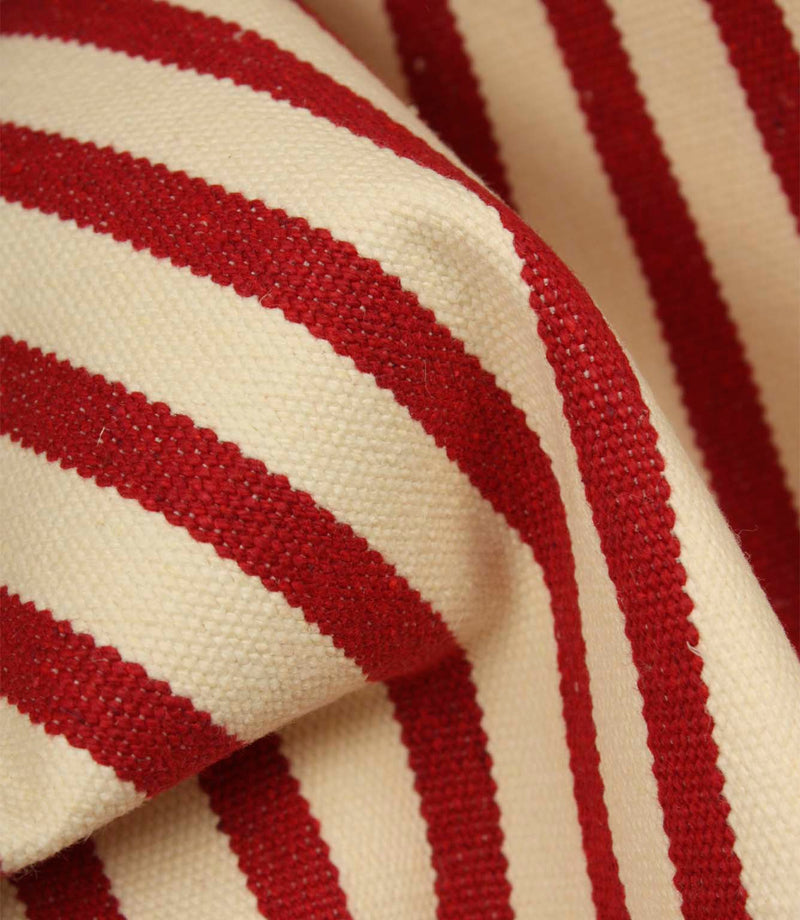 Detailed close-up of Fernley Stripe wine red striped upholstery fire retardant fabric showing the textured weave and traditional stripe pattern.