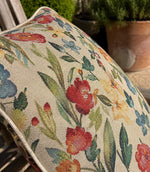 Floral outdoor cushion in woven tapestry outdoor fabric