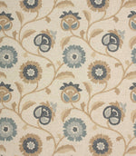 Embroidered floral fabric featuring trailing vines and stylised flowers in cornflower blue, slate grey and natural tones on a soft linen-look background.