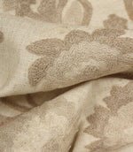 Detailed close-up of raised floral embroidery on Foxmere Natural fabric, showcasing texture and craftsmanship.