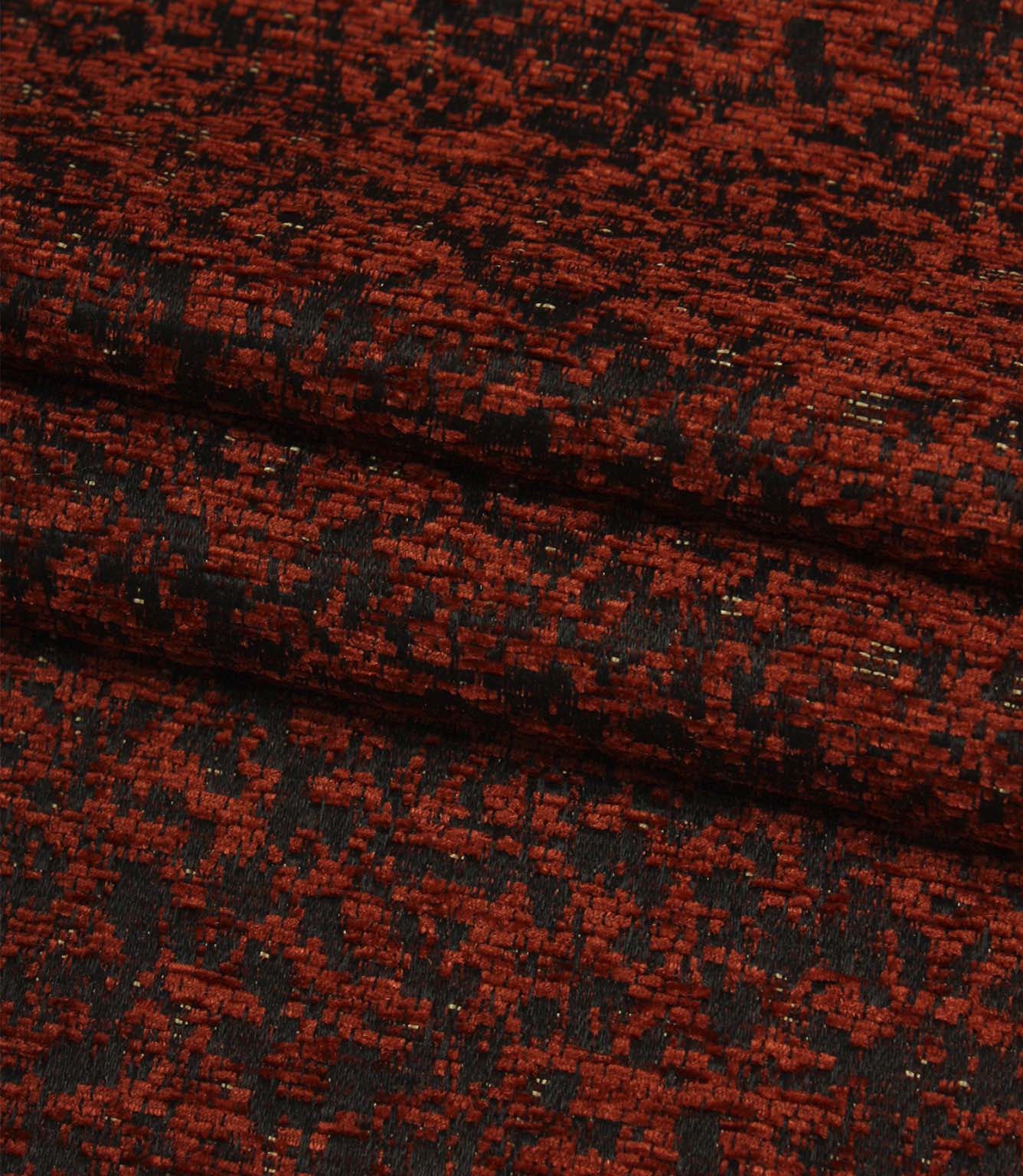 Folded Galaxy fabric showing the depth of the woven design and textured finish in copper and black tones.