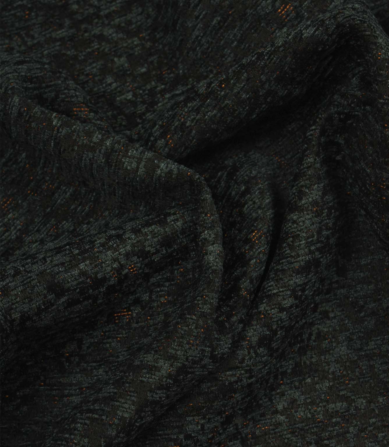Draped Galaxy fabric in emerald green and black, showing the fabric’s soft handle, elegant folds and dimensional woven design.