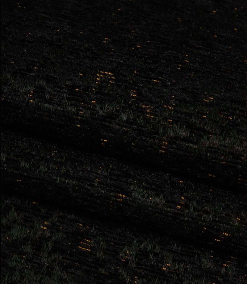 Folded Galaxy fabric in deep noir tones displaying the contemporary weave and subtle metallic detailing.