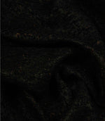 Draped Galaxy noir fabric highlighting its soft texture, elegant movement and understated metallic accents.