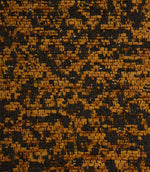 Close-up of Galaxy ochre fabric showcasing the rich woven texture, contrasting black yarns and delicate metallic highlights.