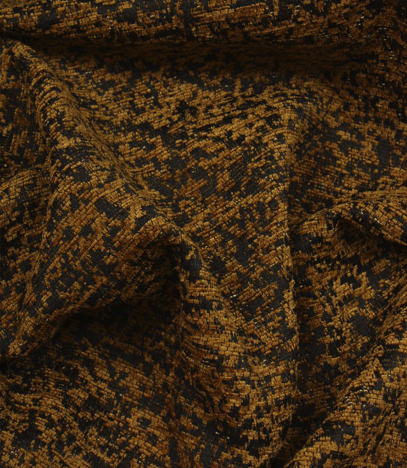 Draped Galaxy ochre fabric highlighting its soft handle, textured woven pattern and elegant movement.