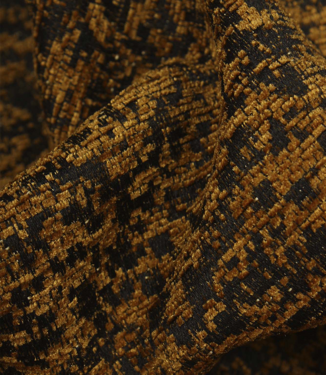 Detailed close-up of Galaxy upholstery fabric in ochre and black, revealing the tactile weave and subtle metallic detailing.
