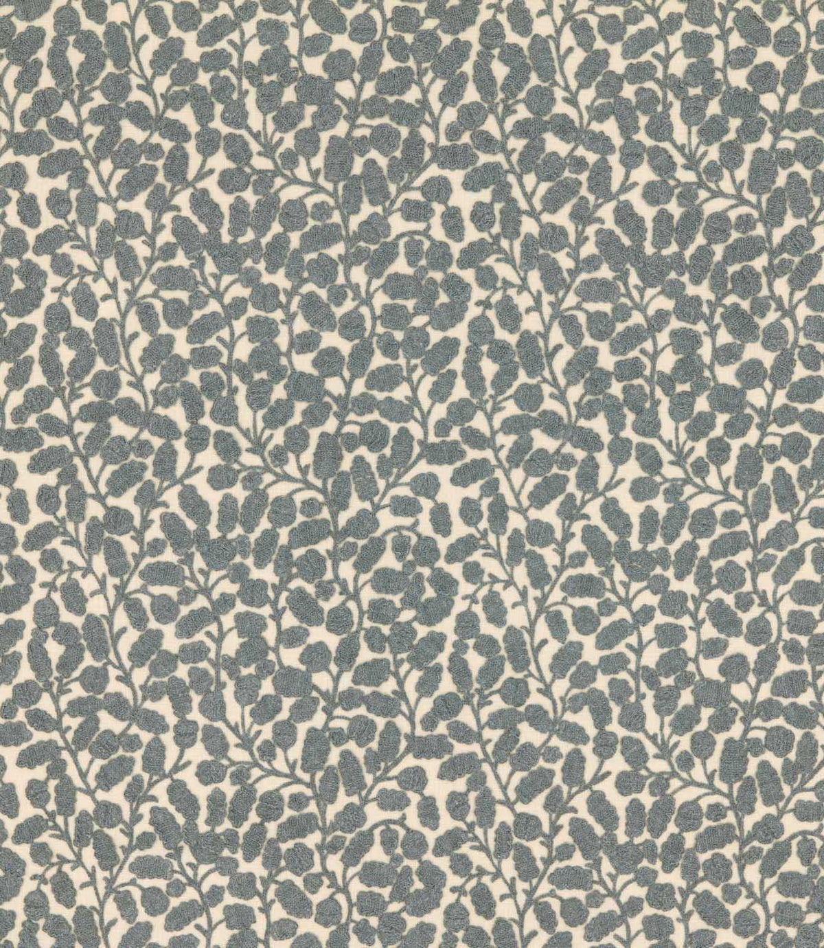 Gardiner Saltwater fabric with a blue-grey embroidered leafy vine pattern, featuring raised textured foliage against a contrasting cream background