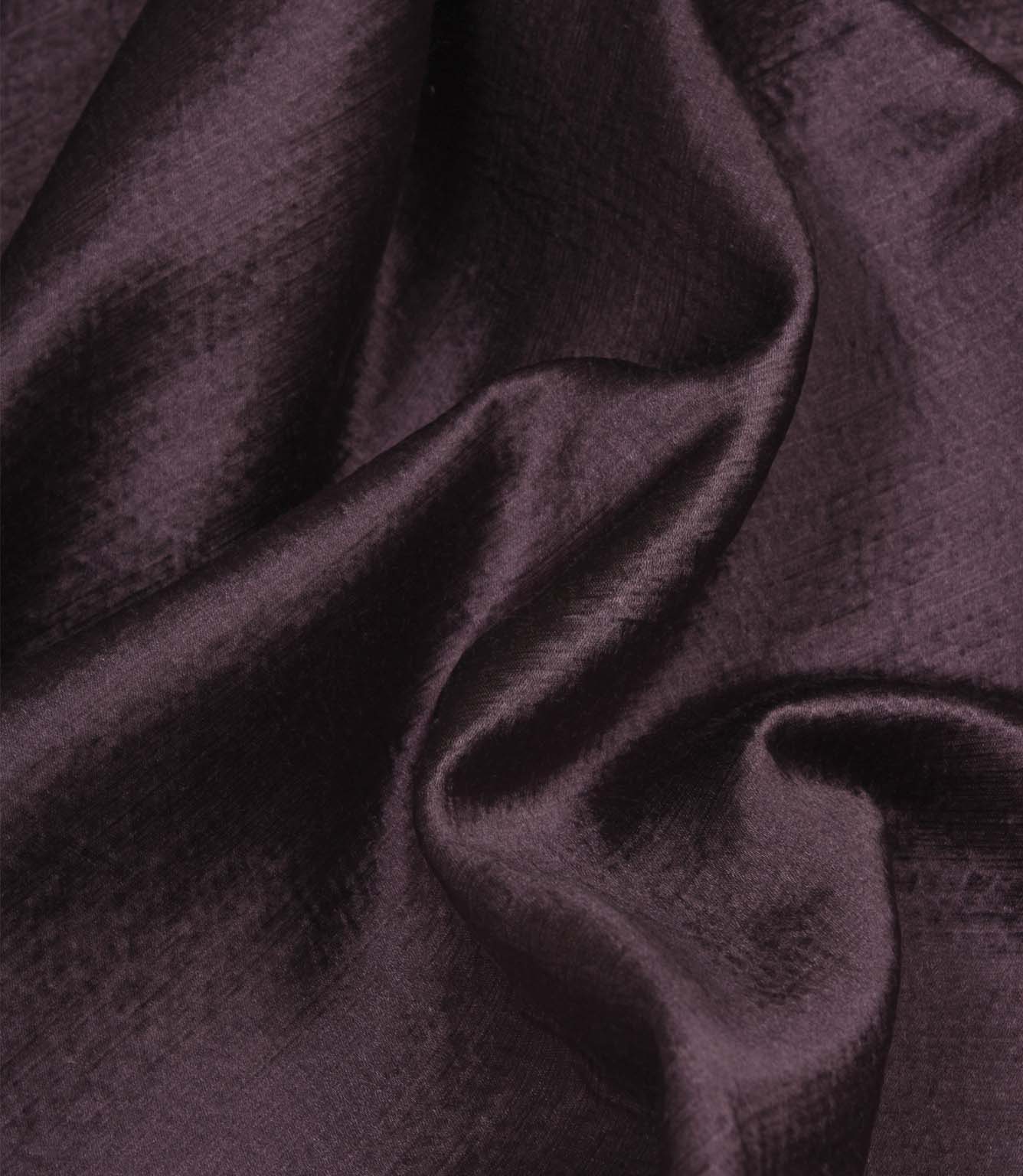 Glaze plum satin-style fabric draped in soft folds, showcasing its luxurious sheen and fluid movement.
