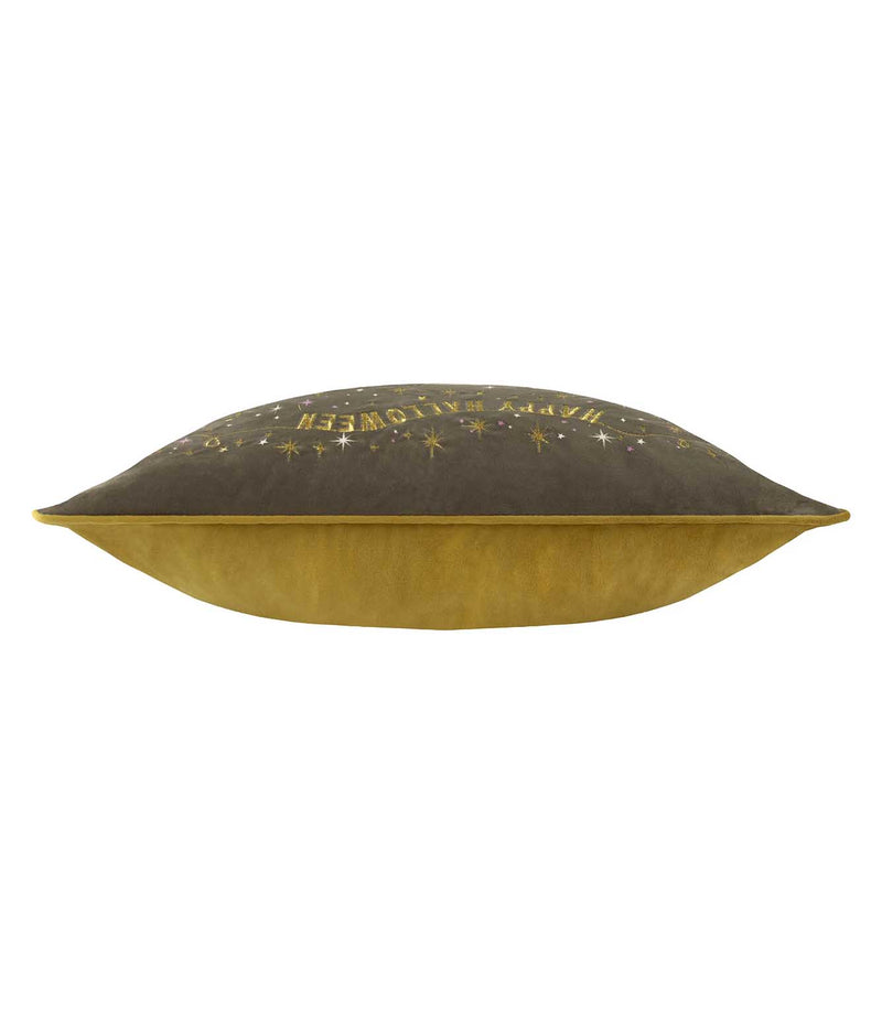 Side view of the Halloween Pawty rectangular cushion showing the charcoal grey illustrated front, mustard yellow velvet reverse and coordinating piped edge.