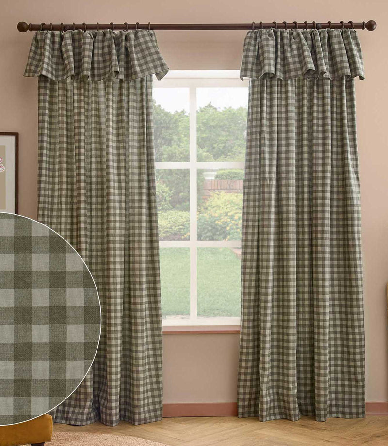 Harriet green and cream gingham check fully lined curtains with gathered ruffle flop-top headers, framing a large window in a living room.