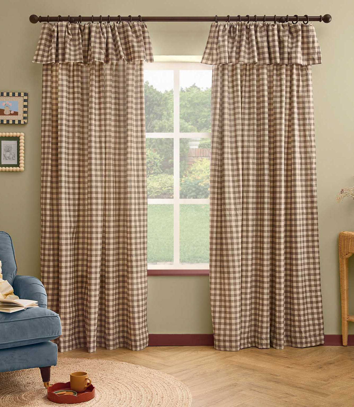 Pair of Harriet natural beige and cream gingham check fully lined curtains with ruffle flop-top headers, framing a large window in a relaxed living room.