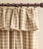 Natural beige and cream gingham check fully lined curtains with gathered ruffle flop-top header on a dark wooden curtain pole.