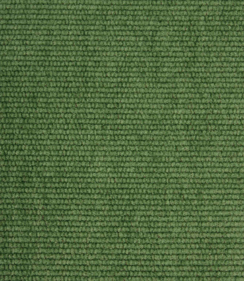 Close-up of Hartwell emerald green woven upholstery fabric showing the detailed textured weave and velour-like finish.
