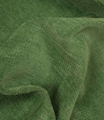 Draped Hartwell emerald green fabric highlighting its relaxed handle, woven texture and upholstery-weight quality.