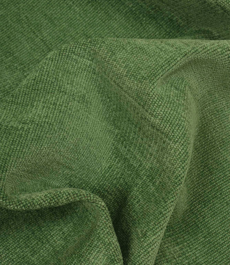 Draped Hartwell emerald green fabric highlighting its relaxed handle, woven texture and upholstery-weight quality.