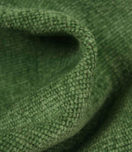 Detailed close-up of Hartwell emerald green upholstery fabric showing the plush woven surface and soft velvet-style appearance.