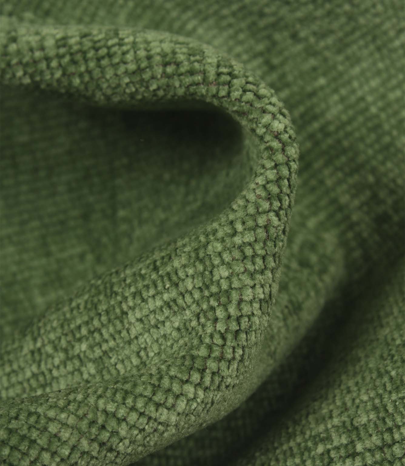 Detailed close-up of Hartwell emerald green upholstery fabric showing the plush woven surface and soft velvet-style appearance.