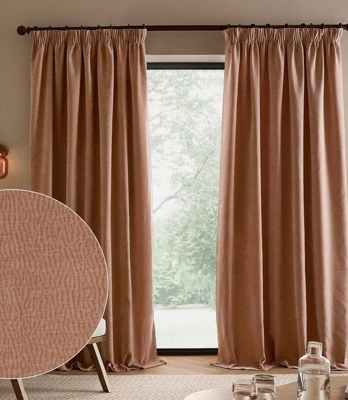 Heath Washed Velvet pencil pleat curtains in soft terracotta-pink Cotta frame a large window, with an inset close-up of the textured fabric.