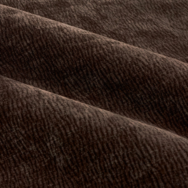 Close-up of espresso brown washed velvet curtain fabric arranged in soft folds, highlighting its rich texture, subtle ribbed pattern and plush finish.
