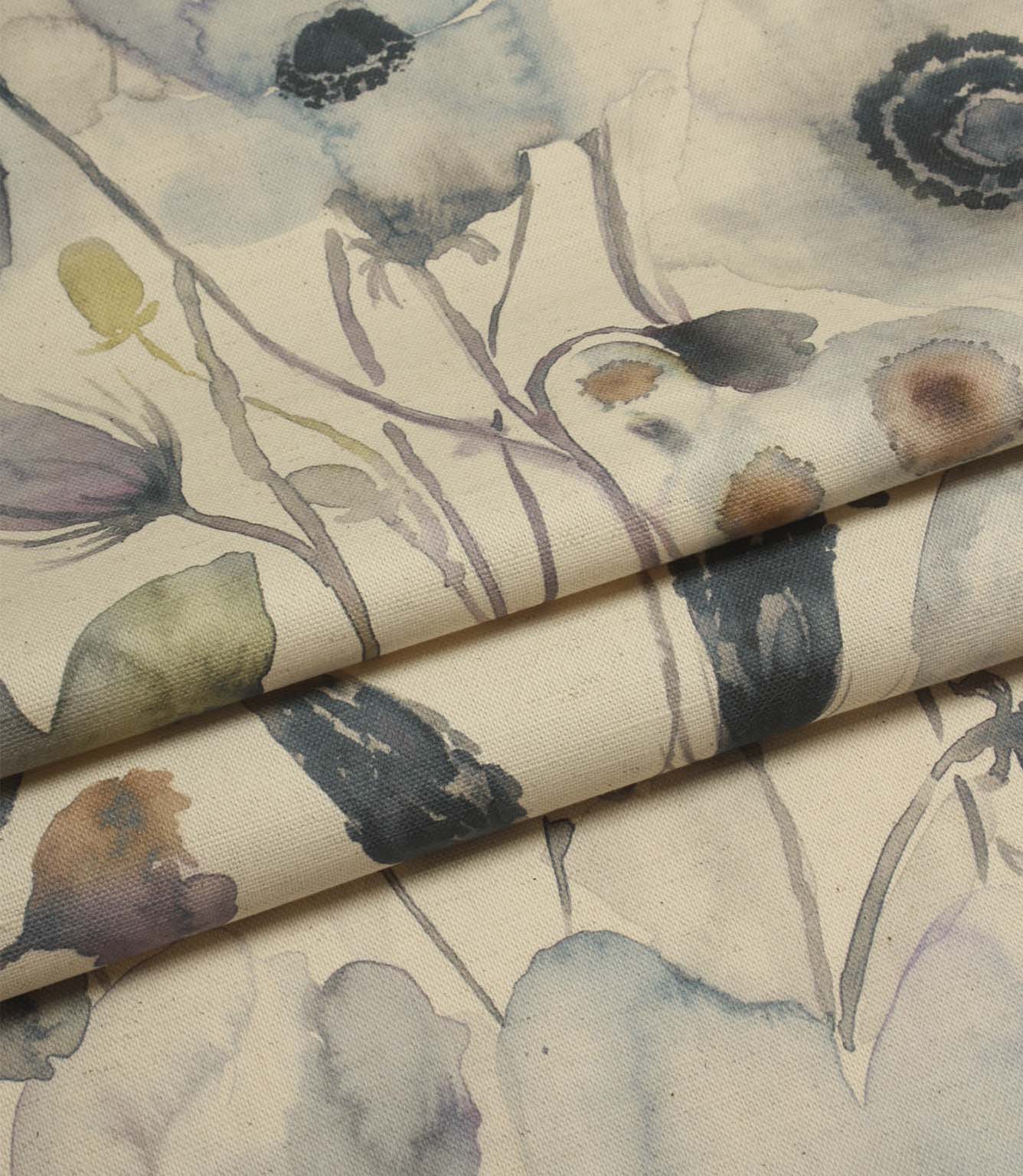 Folded Hibberia Crocus floral cotton fabric showcasing the watercolour botanical design and quality printed finish.