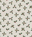 Festive fabric with repeating pattern of green holly leaves with small red berries on a warm off-white background.