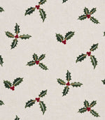 A repeating woven fabric pattern of holly leaves and small red berries on a light beige background.