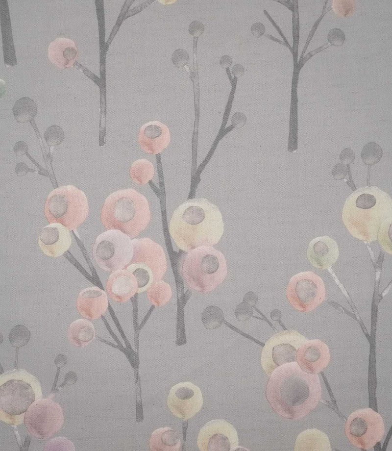 Ichiyo botanical fabric featuring delicate grey branching stems with rounded blush pink, cream and pale green floral motifs on a soft grey background.