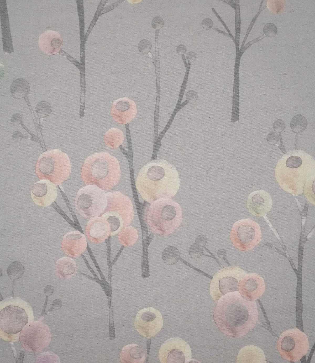 Ichiyo botanical fabric featuring delicate grey branching stems with rounded blush pink, cream and pale green floral motifs on a soft grey background.