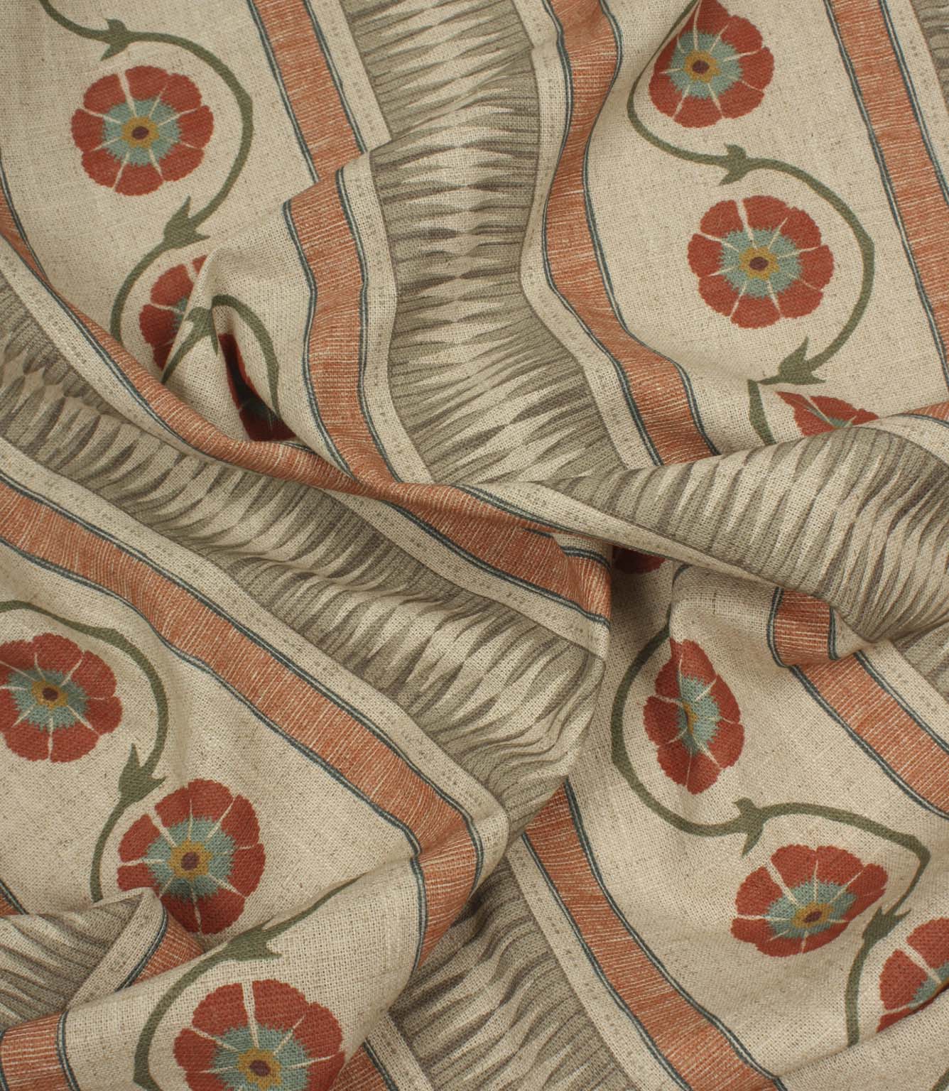Draped decorative fabric featuring stylised flowers and vertical stripe detailing on a natural neutral base cloth.