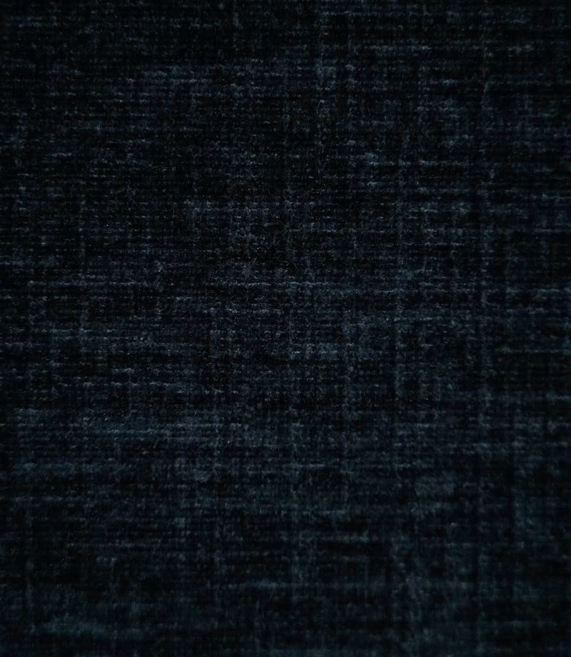 Insernia Velvet Night fabric in a deep charcoal navy shade, featuring a subtle mottled texture with fine horizontal and vertical variations across its soft velvet surface.