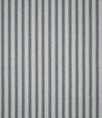 Full view of blue ticking stripe fabric featuring repeating narrow navy blue stripes woven into a natural cream textured ground.