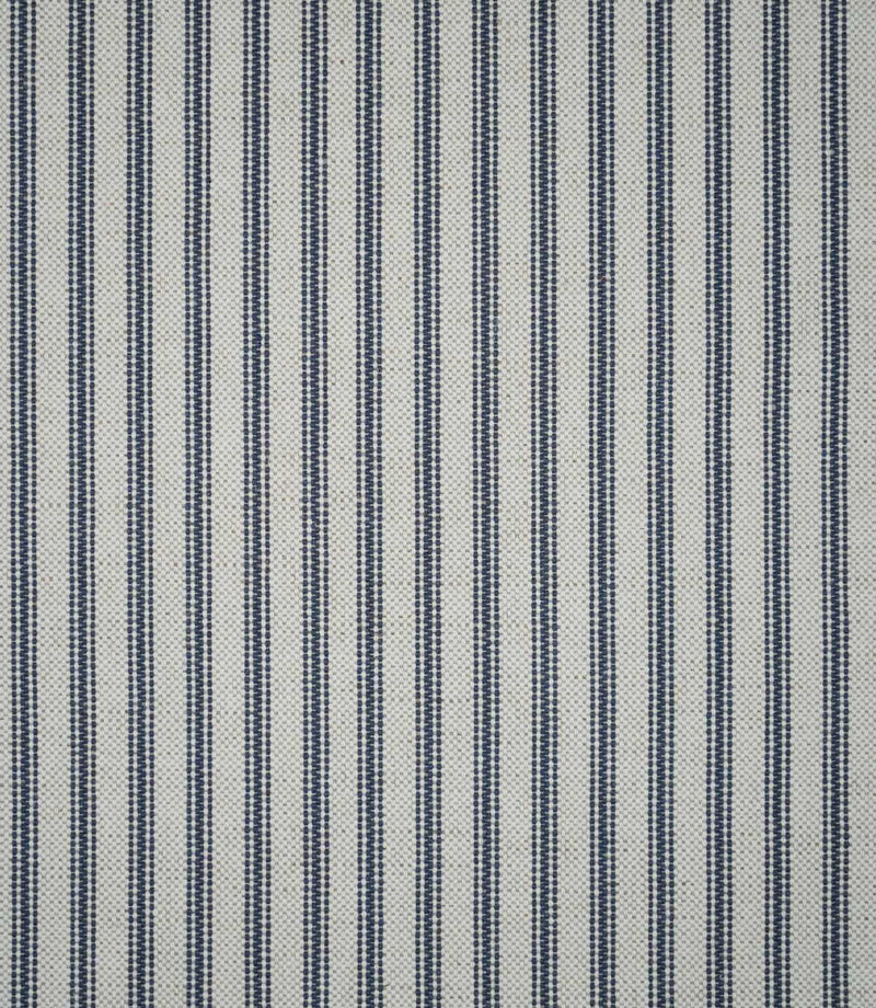 Full view of blue ticking stripe fabric featuring repeating narrow navy blue stripes woven into a natural cream textured ground.