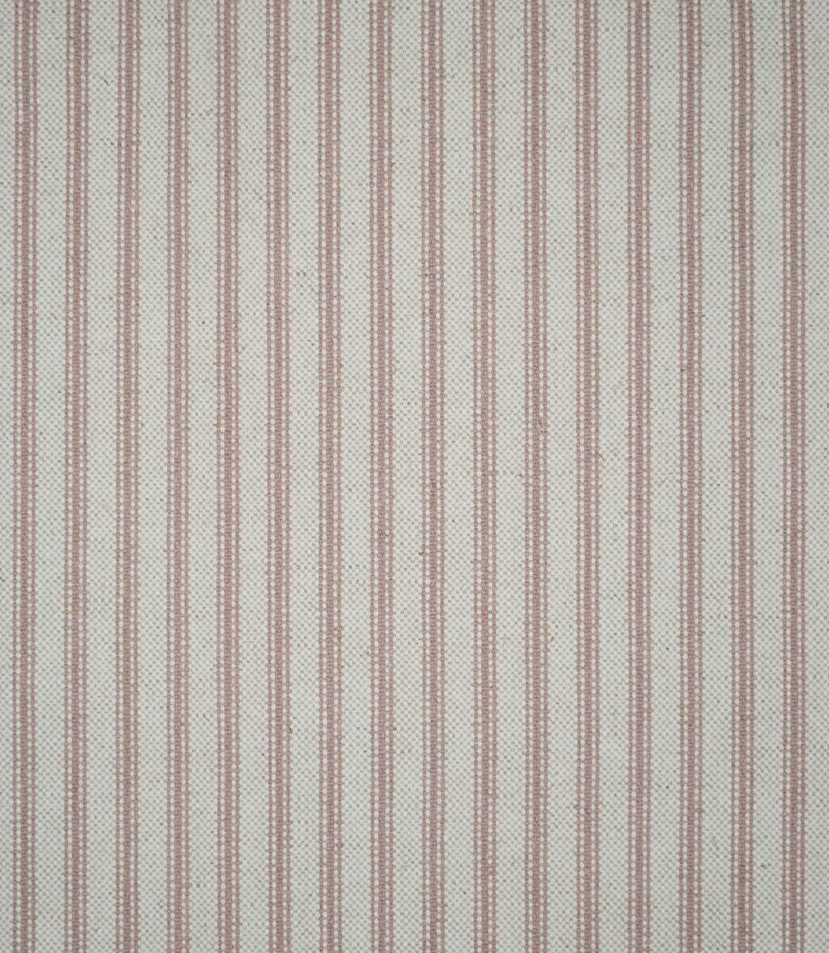 Full view of pink ticking stripe fabric with evenly spaced dusty pink stripes woven across a cream ground in a timeless linear pattern.