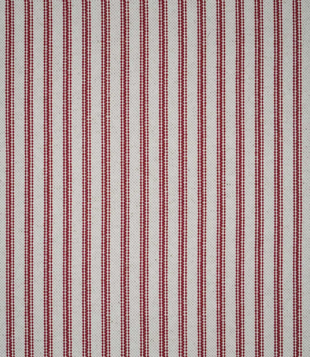 Full view of red ticking stripe fabric with evenly spaced red woven stripes across a natural cream ground, showing the repeating traditional ticking pattern.