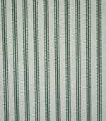 Close-up of sap green ticking stripe fabric with narrow woven green stripes on a natural cream background, showing the textured weave and classic striped design.