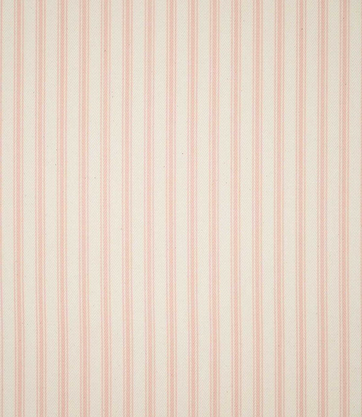 Full view of JF Ticking Pink fabric showing the repeating vertical blush pink ticking stripe design across a warm cream textured background.