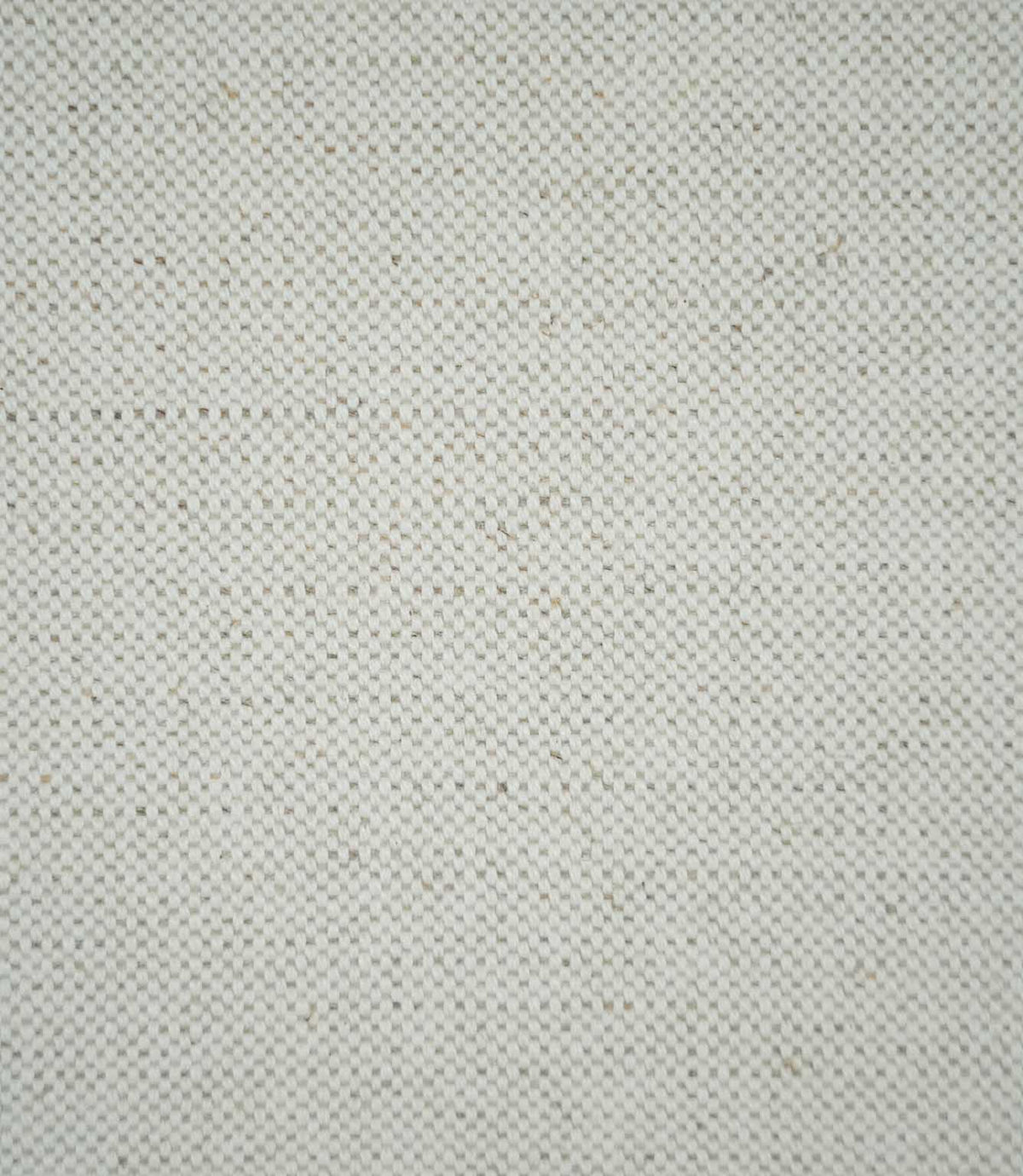 Close-up of JF Ticking Plain Natural fabric showing its cream and ivory tones, tightly woven plain weave texture and subtle beige flecks throughout the material.