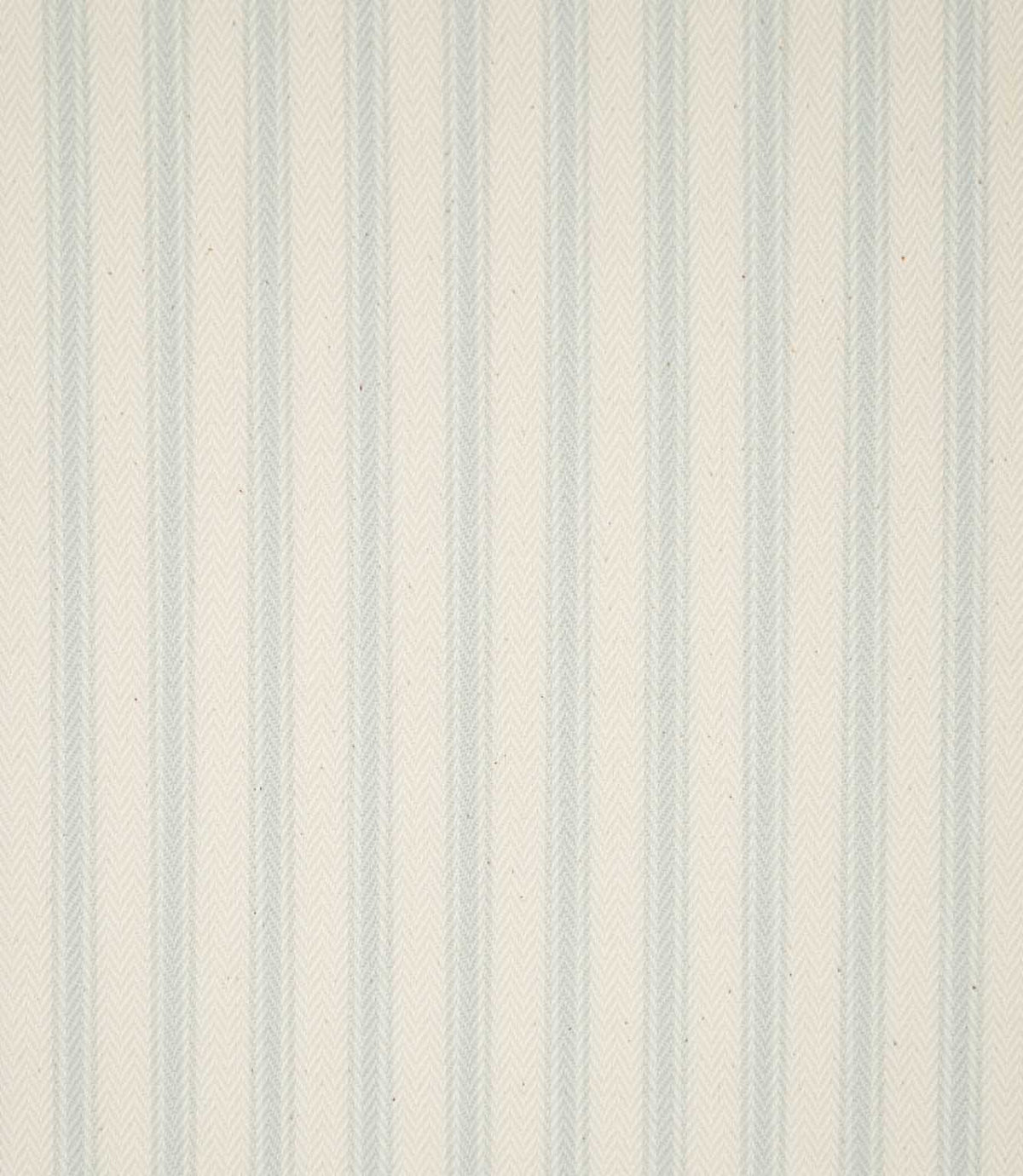 JF Ticking Seaspray fabric featuring soft pale blue ticking stripes on a warm cream background with a subtle woven herringbone texture.