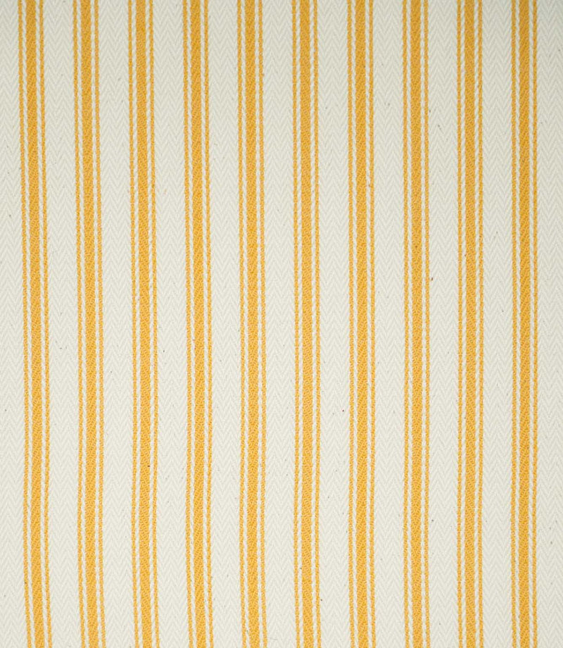 Close-up of JF Ticking Turmeric fabric featuring warm golden yellow vertical ticking stripes on a natural cream background, with a subtle herringbone weave adding texture.