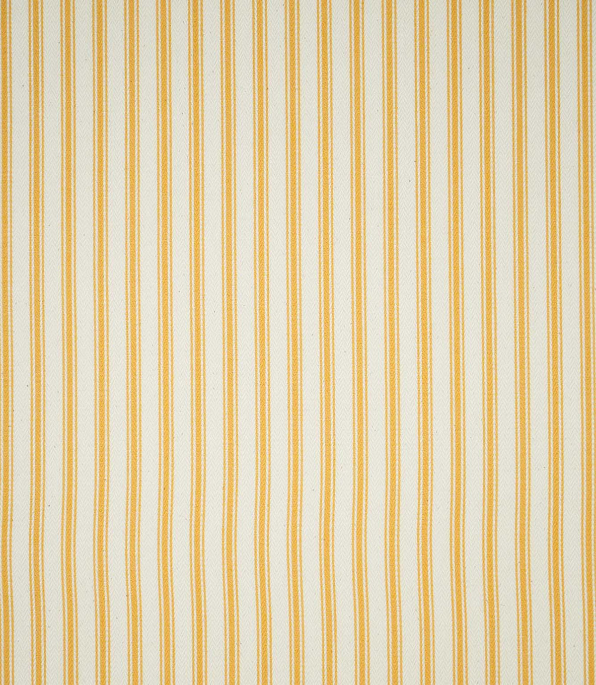 JF Ticking Turmeric striped fabric displaying an evenly spaced vertical ticking stripe pattern in golden turmeric yellow and cream, with alternating fine and wider stripes.