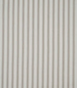 Close-up of beige ticking stripe fabric highlighting the delicate woven stripes and classic herringbone weave.