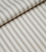 Folded beige ticking stripe fabric showcasing the classic striped design, woven texture and premium quality finish.